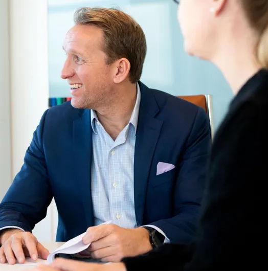 Man in suit smiling