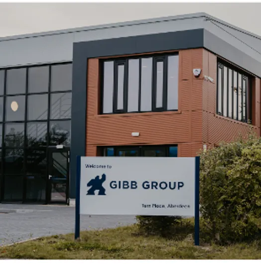 Modern building with Gibb Group sign outside.