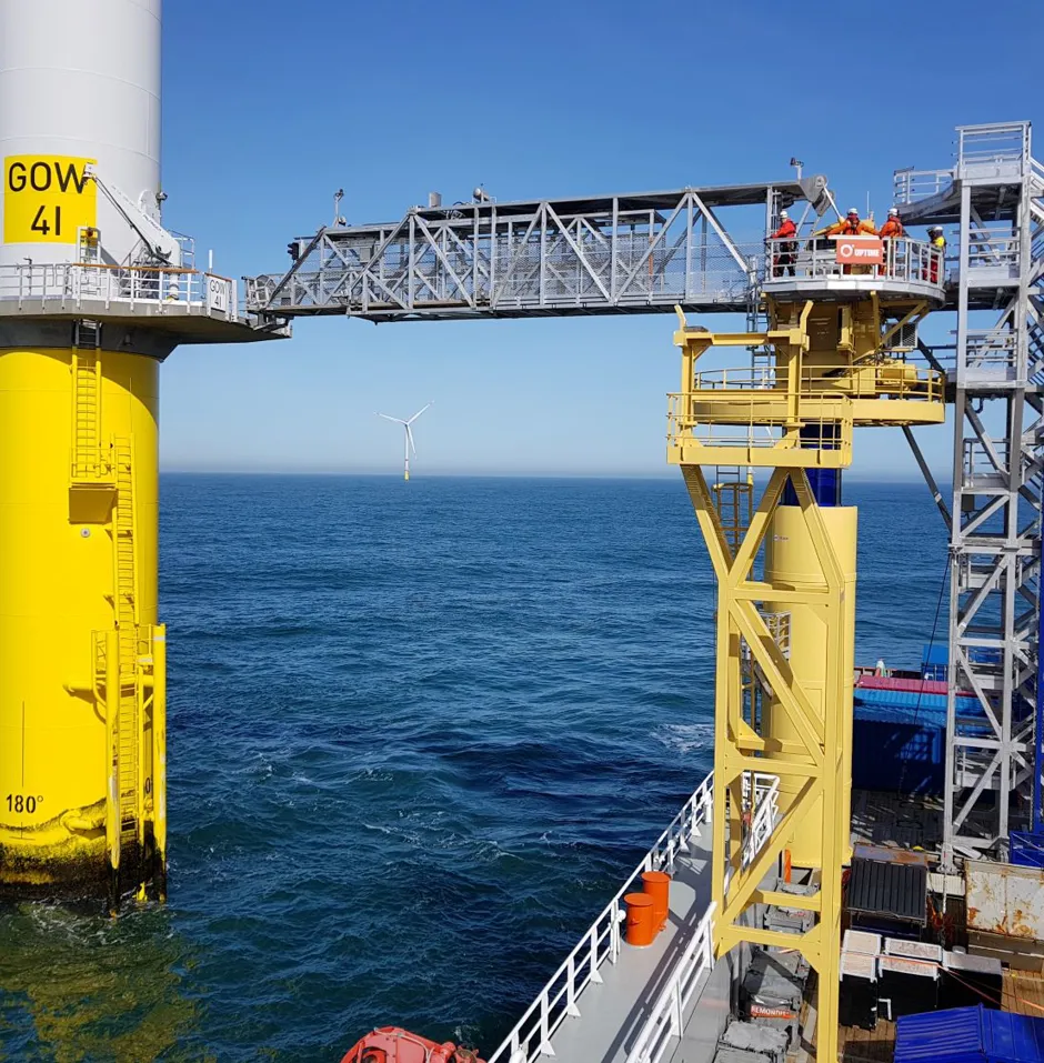 Offshore wind turbine with a service platform.